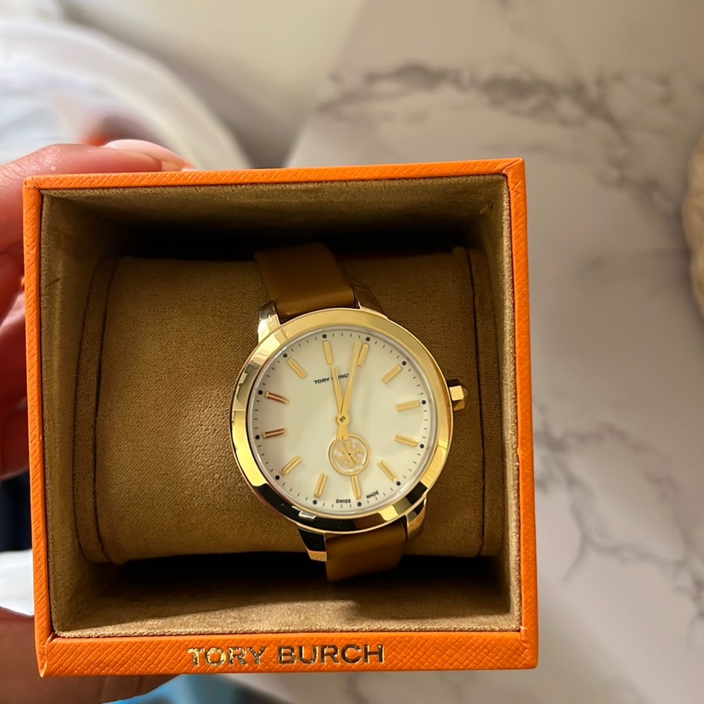 Tory Burch brown leather watch. Needs new battery. Good condition